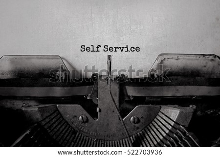 self service typed words on a vintage typewriter