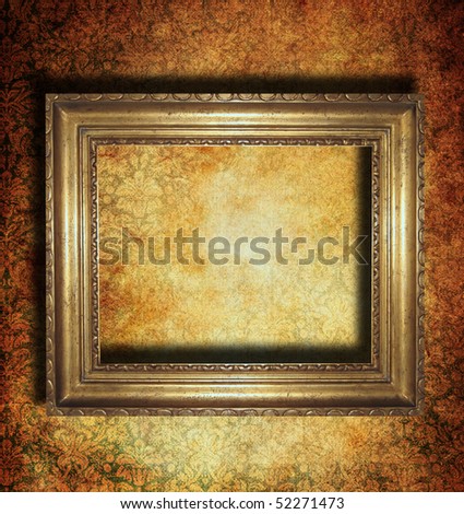 Golden frame over grunge wallpaper
