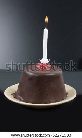 Birthday cake on dark background