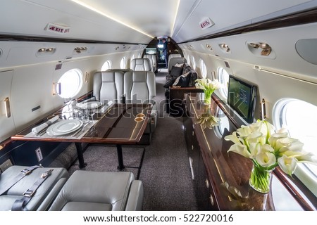 Luxury interior in the modern private business jet Royalty-Free Stock Photo #522720016