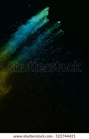 colored powder explosion isolated on black background.abstract powder splatted background,Freeze motion of color powder exploding/throwing color powder, multicolor glitter texture