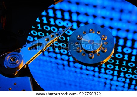 hard disk drive of computer, with future blue binary effects. background.