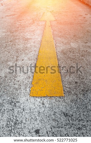 sign of  forwarded yellow arrow on the road business leader concept