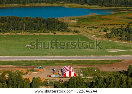General aviation airfield with runaway and hungar.  Bird's eye view