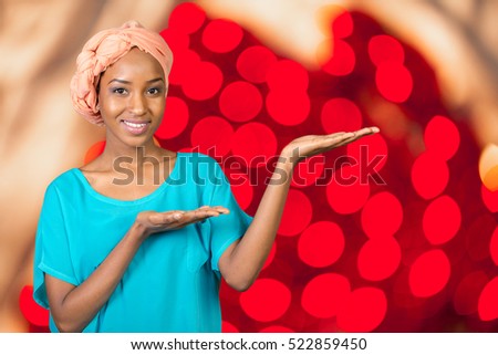 Close up portrait of a happy business woman pointing finger