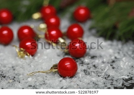 Cristmas red balls, Christmas tree on a dark background with snow