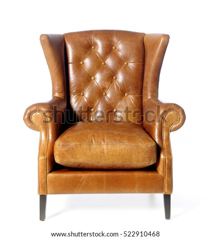 Luxury brown armchair isolated on white background Royalty-Free Stock Photo #522910468