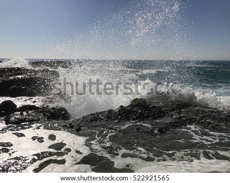 Ocean Waves Crashing on Rocks