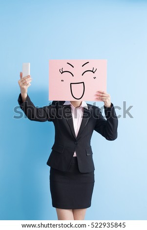 business woman take happy billboard and selfie, isolated blue background