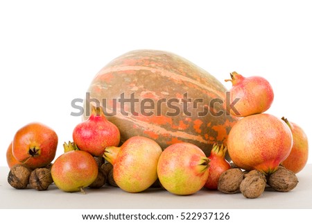 Autumn nature fruits concept. Fall fruits on a white background, studio picture
