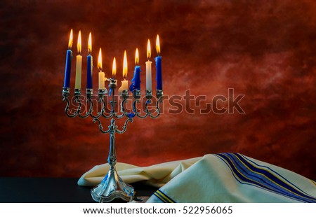 Jewish holiday Hanukkah with menorah tallit traditional