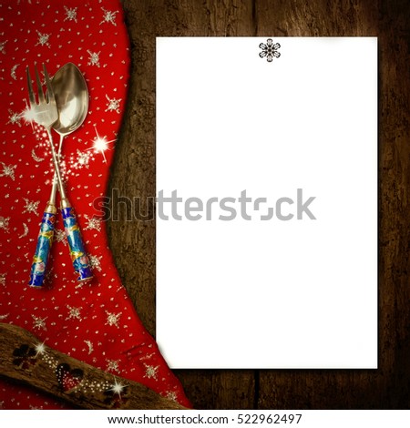 Background for writing the Christmas menu, white paper on old wooden table