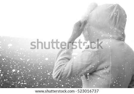 The woman outdoors in winter,fashion in winter,black and white picture


