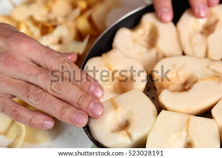 Arranging pears in frying pan. Making Pear Tarte Tatin with Cardamom series.