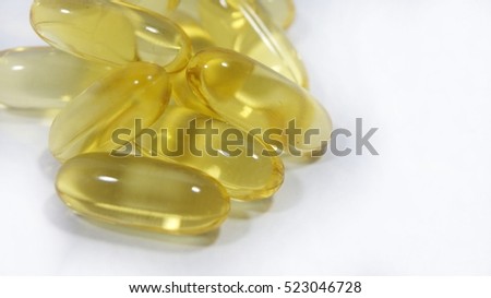 Supplement vitamin medicines in gel capsule isolated on white background