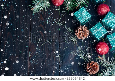 Frame of Christmas colorful toys with snow. Space for text