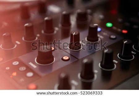 Dj mixer in close up. Professional audio mixer for disc jockey