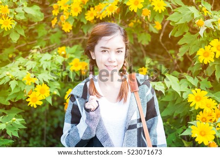 Portrait of a beautiful asian woman with nature background