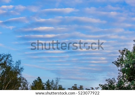 white stripes in the blue sky