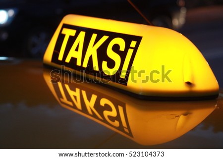 Taxi Royalty-Free Stock Photo #523104373