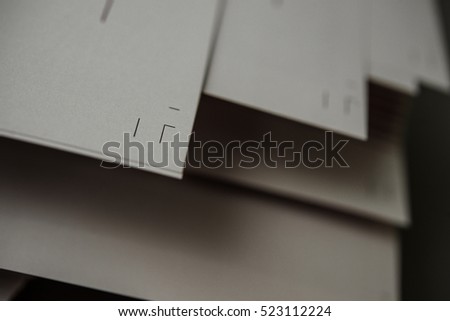 stack of paper with crop marks in print shop