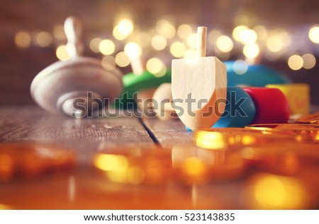 Image of jewish holiday Hanukkah with wooden dreidels colection (spinning top)
