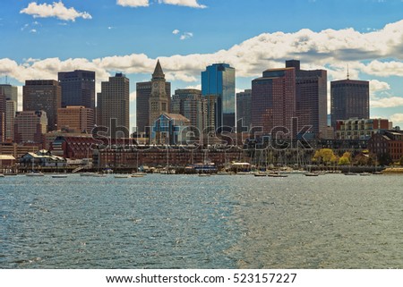 One of the sides of the river Charles with the tallest buildings of Boston, USA. The river flows through 23 cities. Boston is one of the oldest cities in the United States established in 1630.