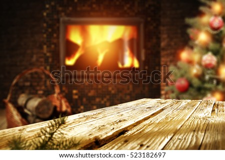 wooden desk xmas tree and fireplace with christmas tree 