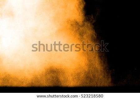 abstract red powder splatted background,Freeze motion of color powder exploding/throwing color powder,color glitter texture on black background