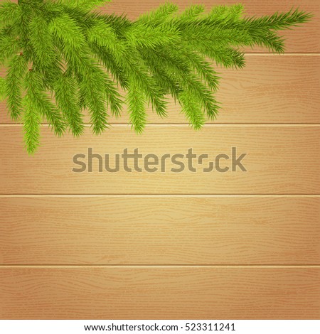 Christmas Wallpaper with spruce branches on the background of wooden boards  For use as logos on cards, in printing, posters, invitations, web design and other purposes.