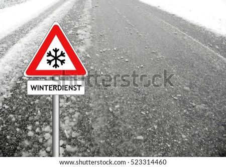 snow warning sign street background