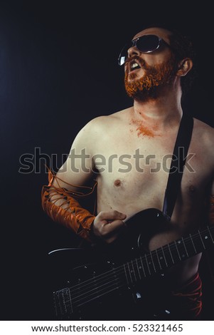 Metal, Rock star with electric guitar and concert hall smoke environment