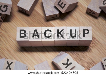 Backup Word Written In Wooden Cube