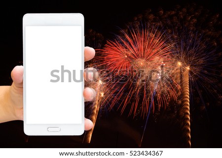 Girl use smart phone , image of firework as a background.