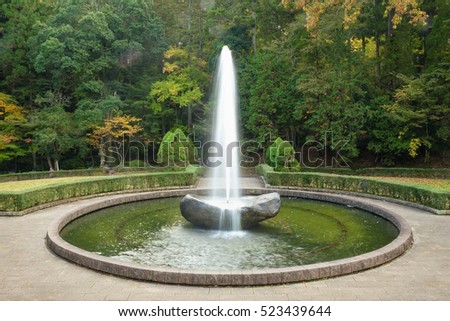 The fountain in japanese garden. Royalty-Free Stock Photo #523439644