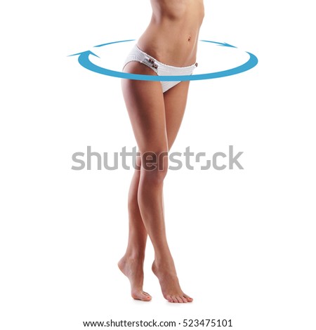 Close-up of thin and beautiful female body isolated on white. Weight loss, sports, exercising, water balance, healthy nutrition concept. Blue arrows.