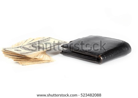 pile of banknotes dollars in leather purse
