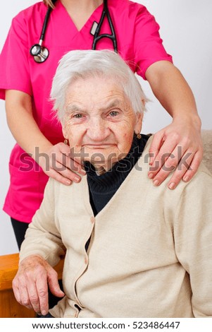 Picture of a senior woman with her caregiver
