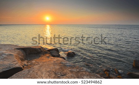 Beautiful sunset at the beach with awesome sky background