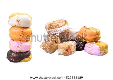 Colorful delicious donuts isolated on white background.