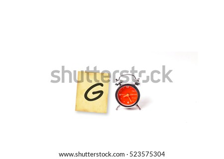 Inspiration  Motivate idea with text "go" on grunge paper with old retro clock ,isolated on white background.