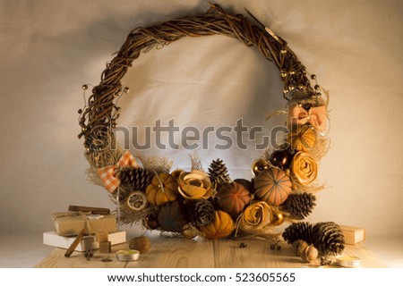 Christmas wreath on the door of handmade. Christmas decoration with pine cones , balls and ribbons.