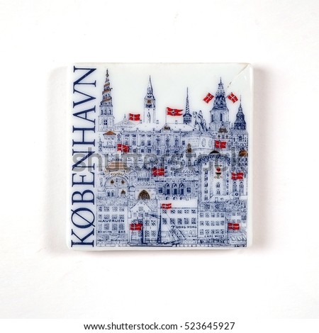 Souvenir from Denmark with the image of ancient buildings isolated on white background. The inscription on the Danish capital is the name of the "Copenhagen" in English