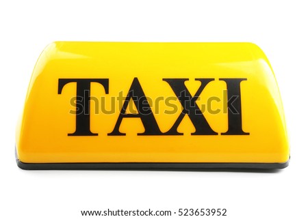 Yellow taxi roof sign on white background, closeup