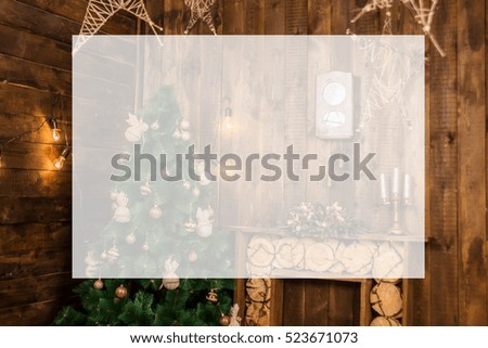 Christmas background with place for text insertion, decorations rustic, Christmas tree with garlands, fireplace and dark wood