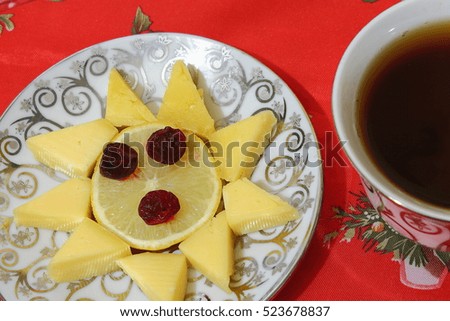 On the eve of Christmas. Tea drinking with cheese.