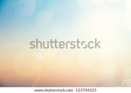 Abstract focus blur morning nature sky scenery fill bokeh texture background concept for hope faith in ramadan, horizon landscape peace calendar wallpaper, people business event book, sunshine on sand Royalty-Free Stock Photo #523704325