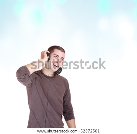 Man  Listening to Music over abstract background