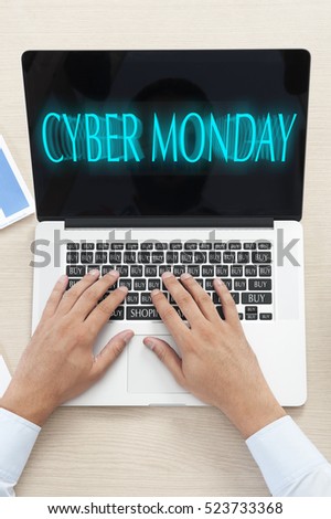 Top view of hand typing on laptop keyboard, Cyber Monday Shopping