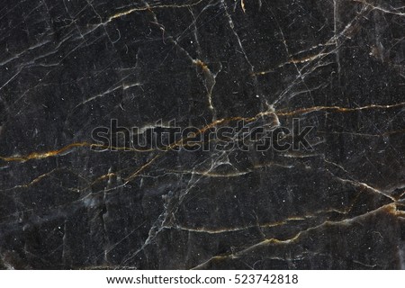Patterned natural of dark gray marble (Gold Russia) texture background for product design Royalty-Free Stock Photo #523742818